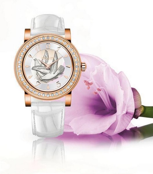 Luxury feminine gold watch emblem of peace, 40 diamonds